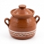 Authentic Sifnos ceramics handcrafted brown glazed clay pot with white wavy line pattern, lid, and two handles on white backg...